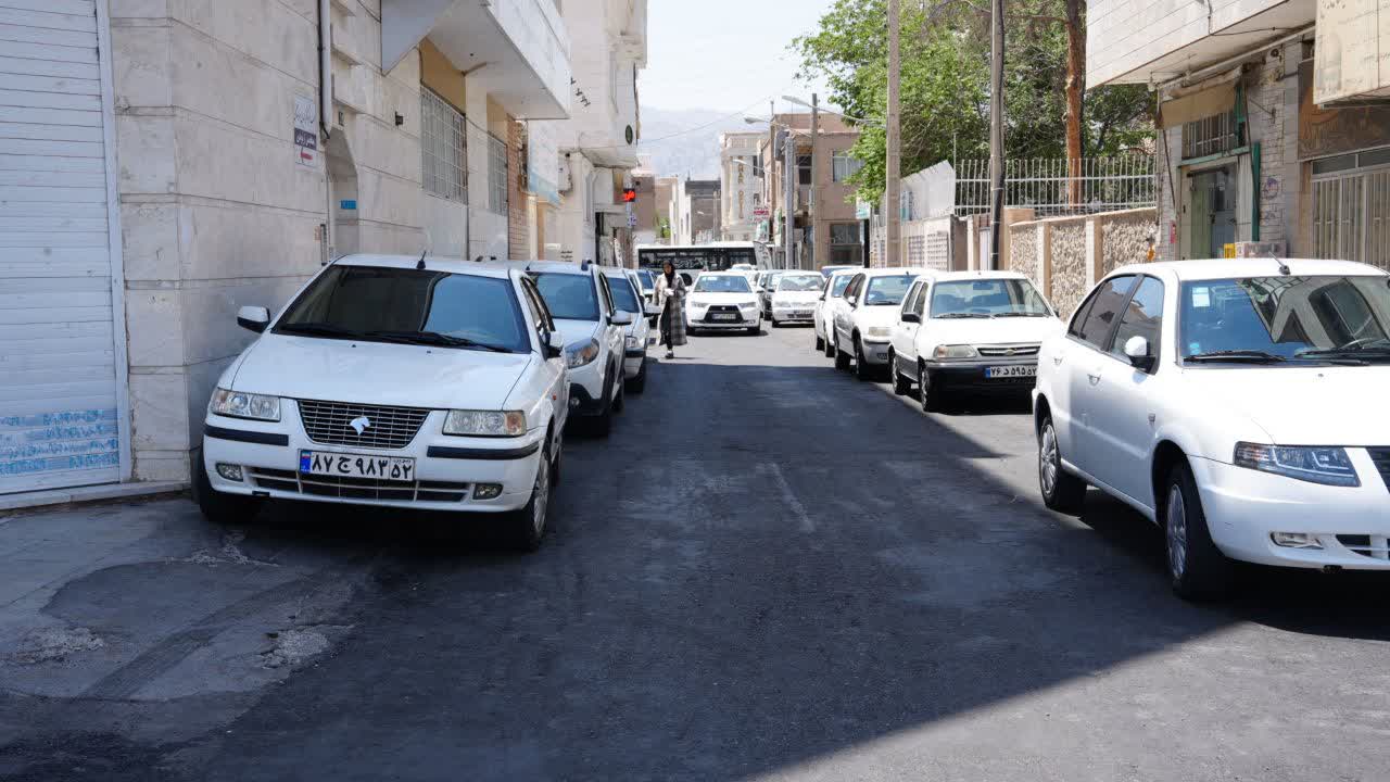 گزارش تصویری از روکش آسفالت خیابان طالقانی ۳ و معابر اطراف